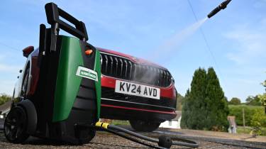 Auto Express products editor Tom Barnard washing a Skoda Superb with a Hawksmoor High Pressure Washer
